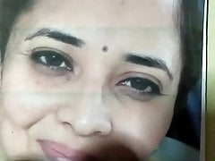 Actress Anusuya face rubbing