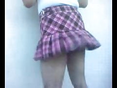 Again in mini skirt