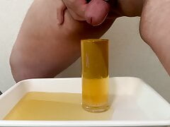 Small Penis Cumming And Pissing In A Glass Of Water