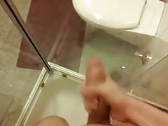 Shooting a huge load on the shower glass