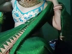 Indian Gay Crossdresser Gaurisissy pressing his boobs so hard and enjoying in green Saree