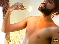 Young Uncut Latino In Colorful Christmas Wax Play With Carols In The Back