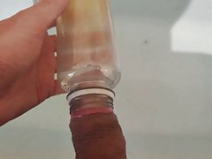 Amateur pissing in a bottle