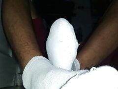 White socks and smelly feet in my room