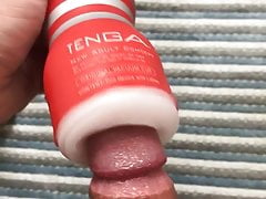 Oiled thick cock in a tenga