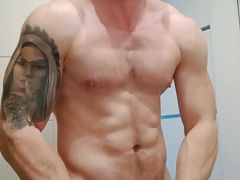 Muscular fitness guy is doing muscle worship and later jerking off