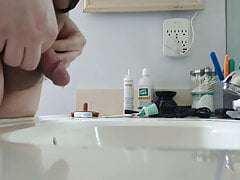 Cub Pissing in Bathroom Sink
