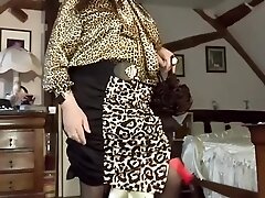 In skirt outfit, leopard blouse for one evening