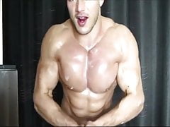 Handsome bodybuilder teasing with his big cock muscle