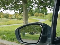 Handjob in a car in public