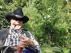 Cowboy dad on break and pumping his cock