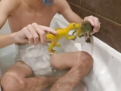 ABDL Diaper Boy Playing With Dinosaurs toys in the Hot Tube