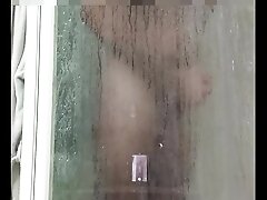 I spy on my husband while he takes a shower....it made me want to fuck watching him masturbate