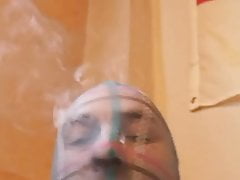 Smoking with pantyhose on head