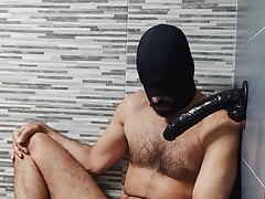 Masked daddy moaning and sucking dildo