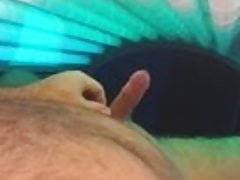 jacking off in tanning bed