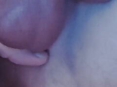 lying in bed and playing with my cock and riding a dildo