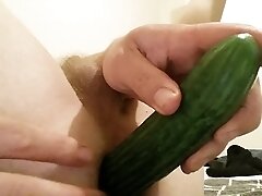 He fuck himself with a cucumber