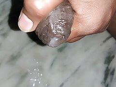 Indian black cock cumming video while playing with the black cock in bathroom
