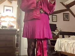 In fuchsia flight attendant outfit for one evening
