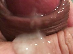 Close up forskin rolling with cumshot