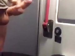 Young boy jerks off in a train