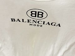 Finishing pissing on her Balenciaga t-shirt