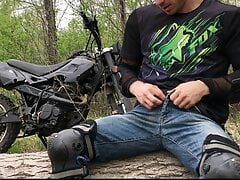 Handsome BIKER while riding a MOTORCYCLE in the forest JERKS OFF and CUMS in public