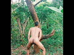 Nude sexy men having fun in jungle