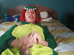 Horny Asian guy jacking off wearing furry dinosaur onesie. C