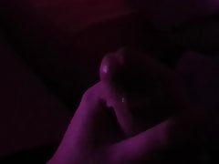 Cumming in purple light
