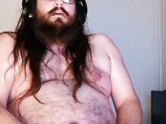 Fat bear masturbates and cums on his chest