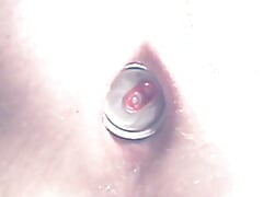 Anal plug play with a bottle.