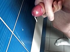 Stroking my cock and cumming in school