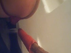 home made water dildo in the bath tub