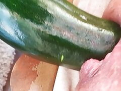Summertime with assplaying with a courgette