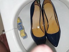 Pissing into Dark Blue Stilettos bought from a bank employee