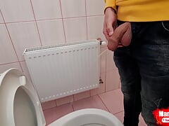 Guy pisses in a public toilet and takes a selfie
