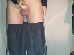 boy in sport shorts smoking and jerks ass play