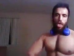 bearded muscle man shows off body and cock