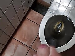 Twink jerks on public toilet