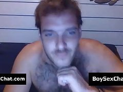 Hairy dude showing his cock in webcam