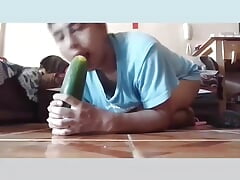 Sucking huge cucumber