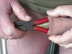 Foreskin with pliers and a hammer