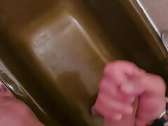 Cumshot in a bath