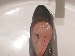 Whore's shoe filled with hot piss