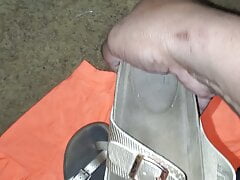 taken worn sandals from customer car garage