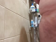 Bear Shoves Dildo up His Ass Before Showering